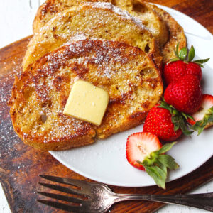 toast with melted butter and strawberries