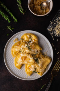 sharp white cheddar pierogies with rosemary butter sauce
