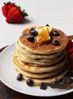 chocolate chip pancakes stack with butter and honey