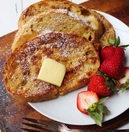 sourdough french toast with butter and strawberries
