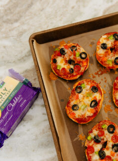 tray full of pizza bagels made with TFF cheese