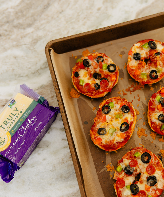 tray full of pizza bagels made with TFF cheese