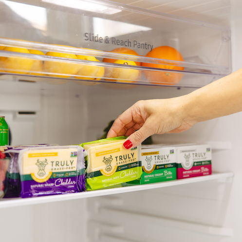 truly grass fed cheese blocks in a fridge