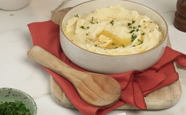 mashed potatoes in a bowl with butter melting