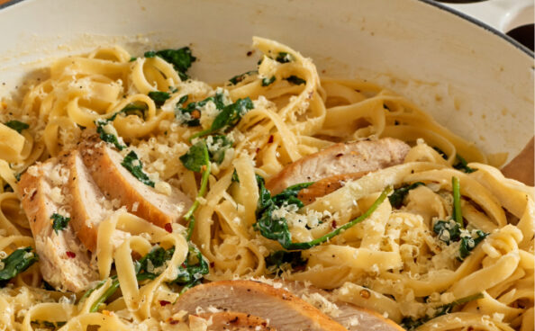 creamy chicken and alfredo chicken pasta dish